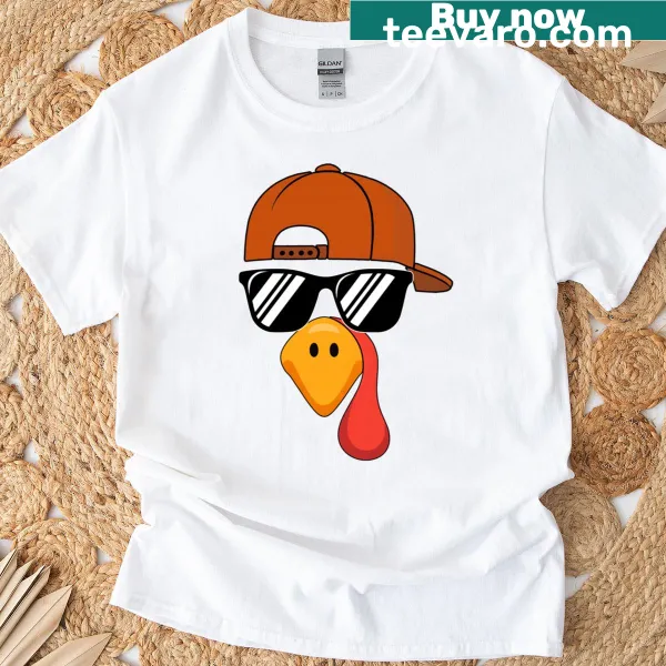 Cartoon turkey wearing a hat and glasses on T-shirt