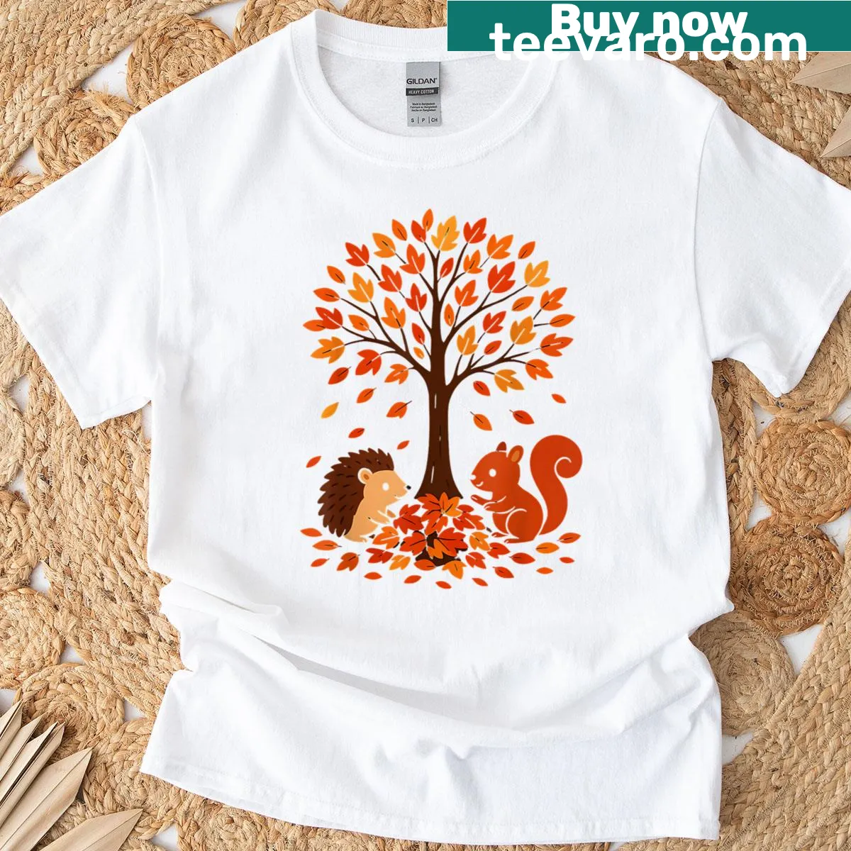 Autumn-themed T-shirt with leaves and forest creatures illustration — on a men's t-shirt