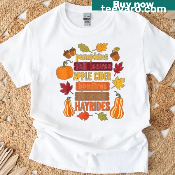 Autumn themed t-shirt with pumpkins and fall graphics