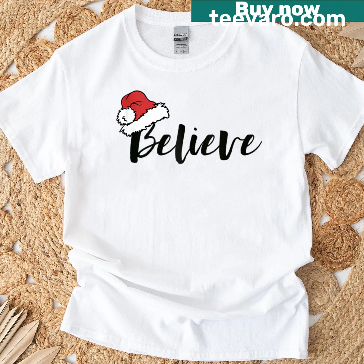 Christmas T-shirt featuring a whimsical Believe In Santa Claus design — on a men's t-shirt