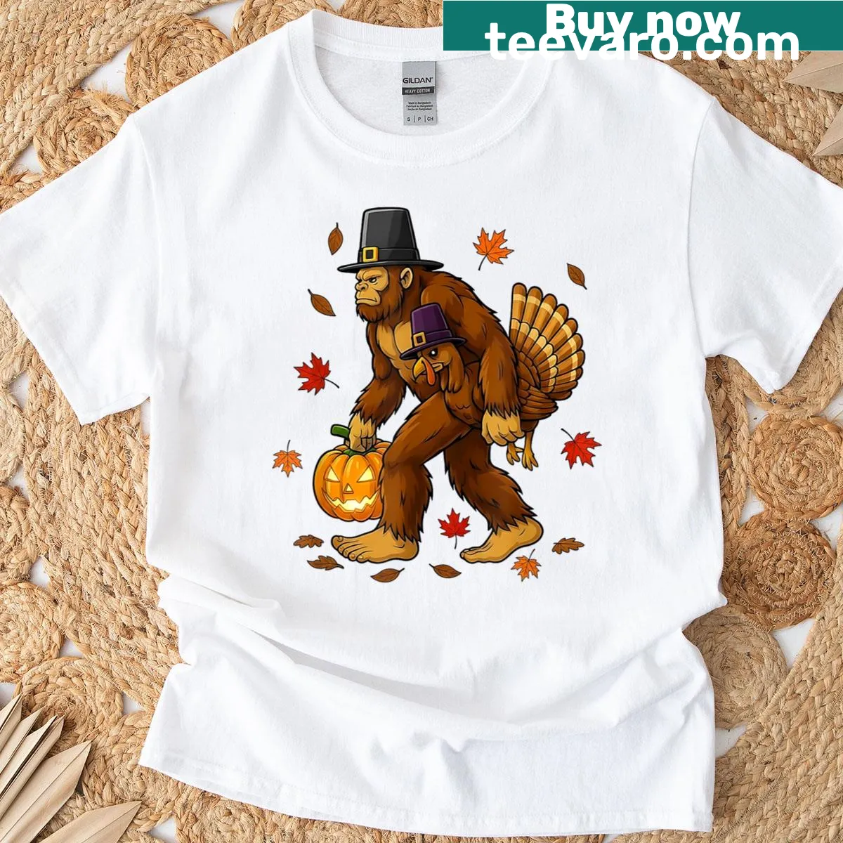 Cartoon Bigfoot as a pilgrim with Thanksgiving symbols on a T-shirt. — on a men's t-shirt