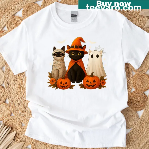 Whimsical Halloween design with a black cat, witch, and pumpkin t-shirt
