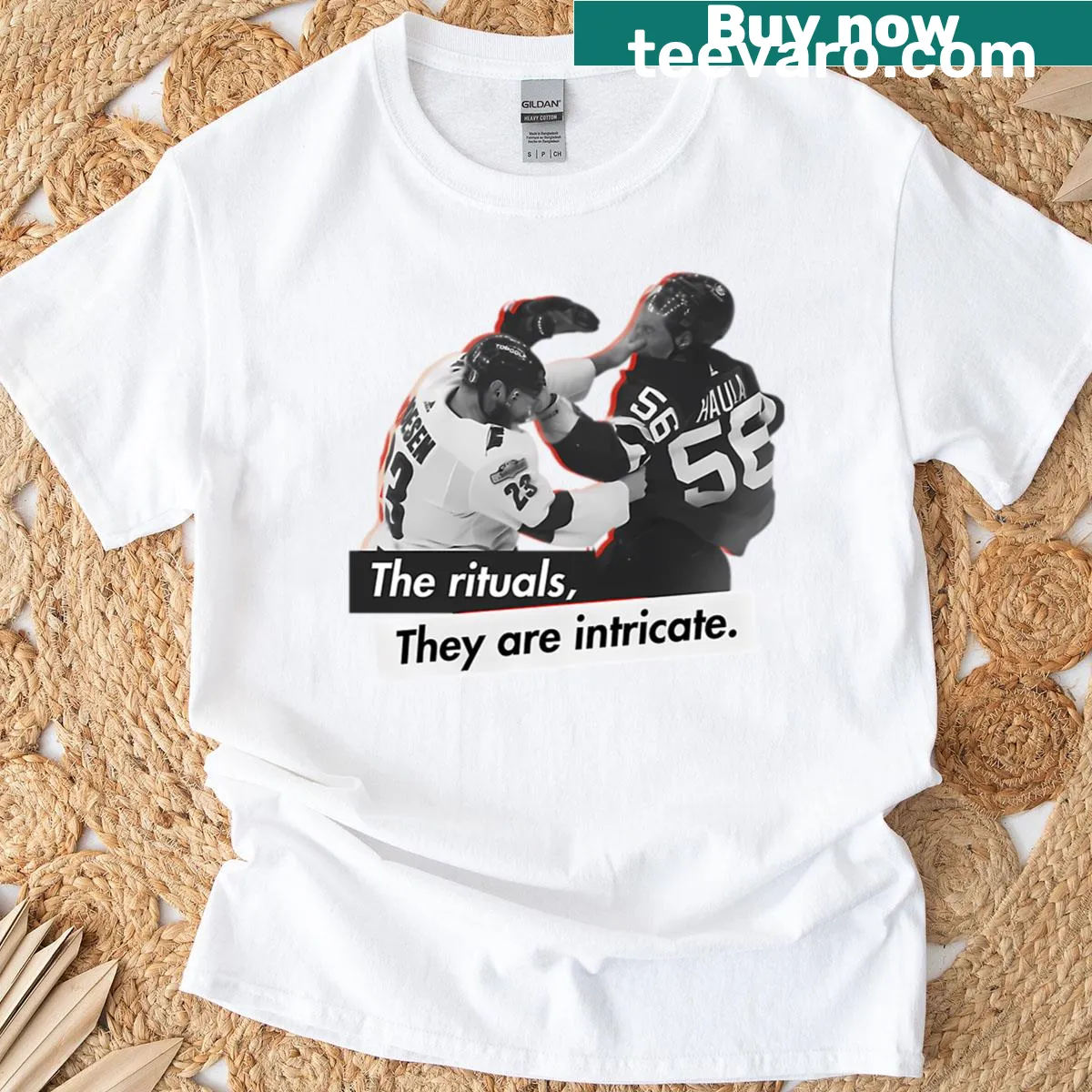 Carolina Hurricanes hockey-themed T-shirt with stick and puck illustration — on a men's t-shirt