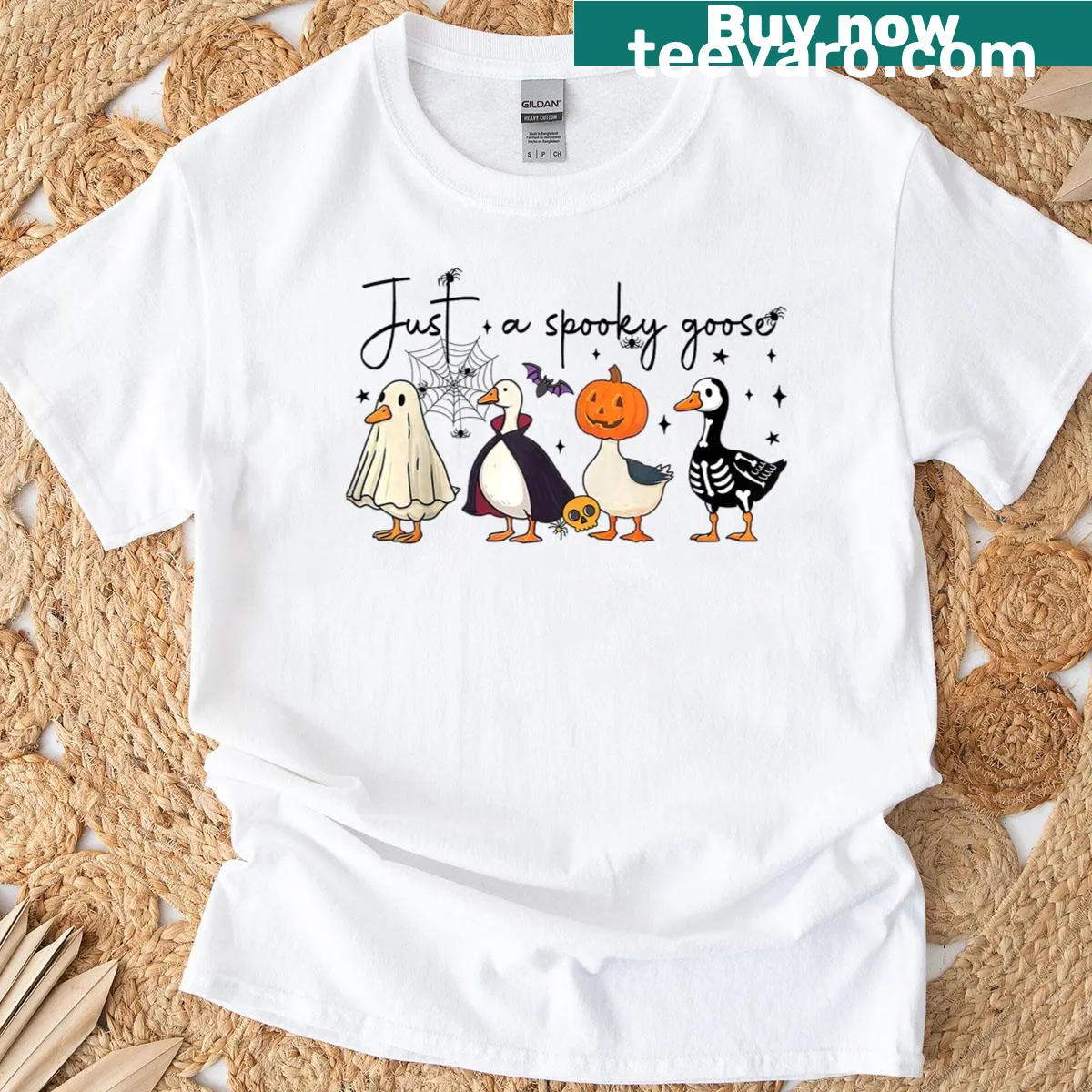 Cartoon Halloween t-shirt with a spooky goose and witch design — on a men's t-shirt
