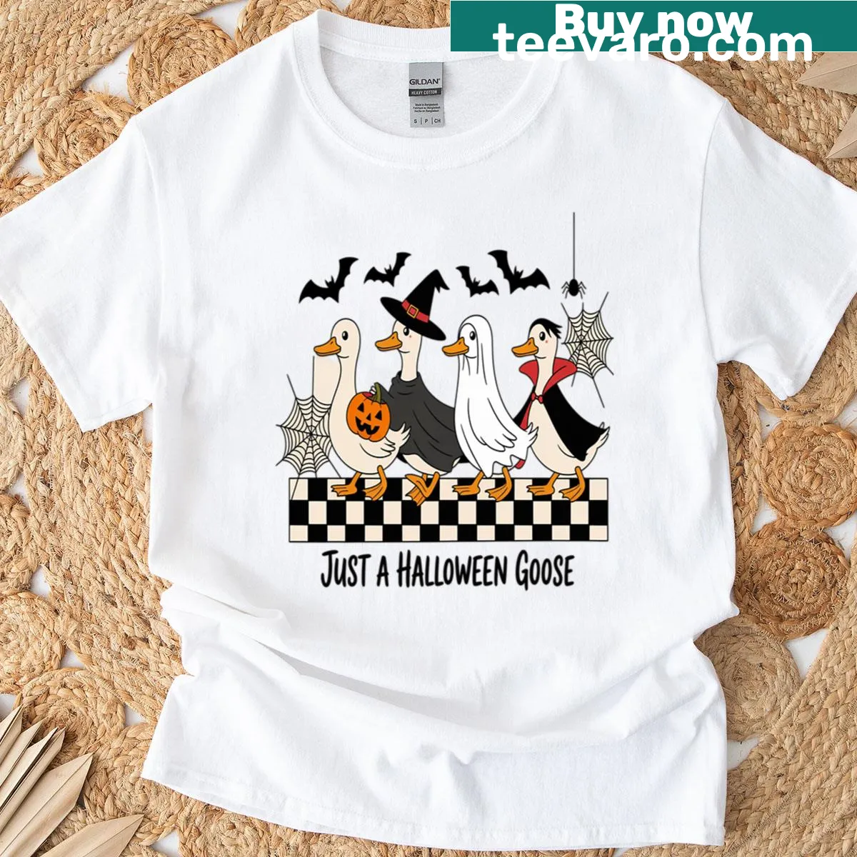 Cartoon Halloween goose T-shirt with playful design — on a men's t-shirt