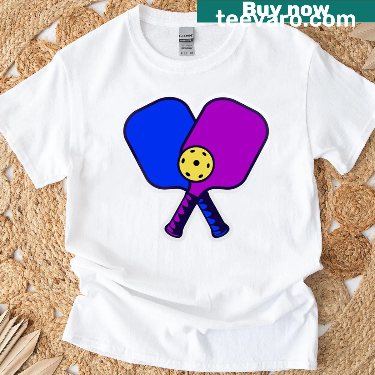Pickleball-themed sticker art print T-shirt featuring paddles and balls — on a men's t-shirt