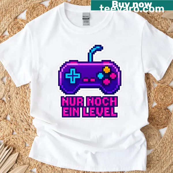 Graphic tee with pixel game controller and slogan Just One More Level
