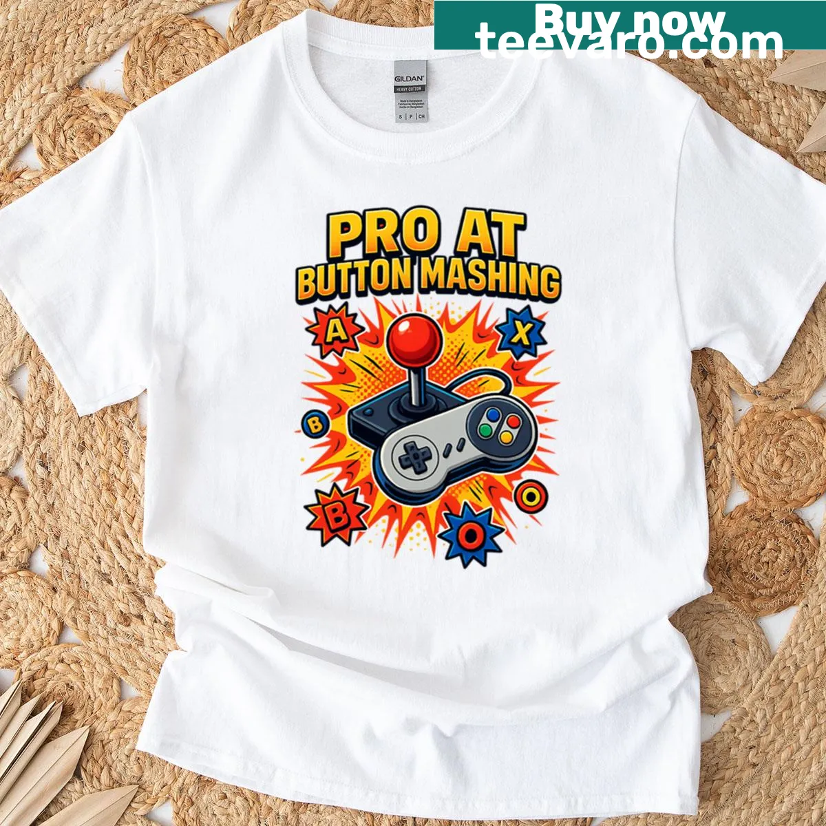 Comic blast graphic T-shirt featuring a joystick controller — on a men's t-shirt