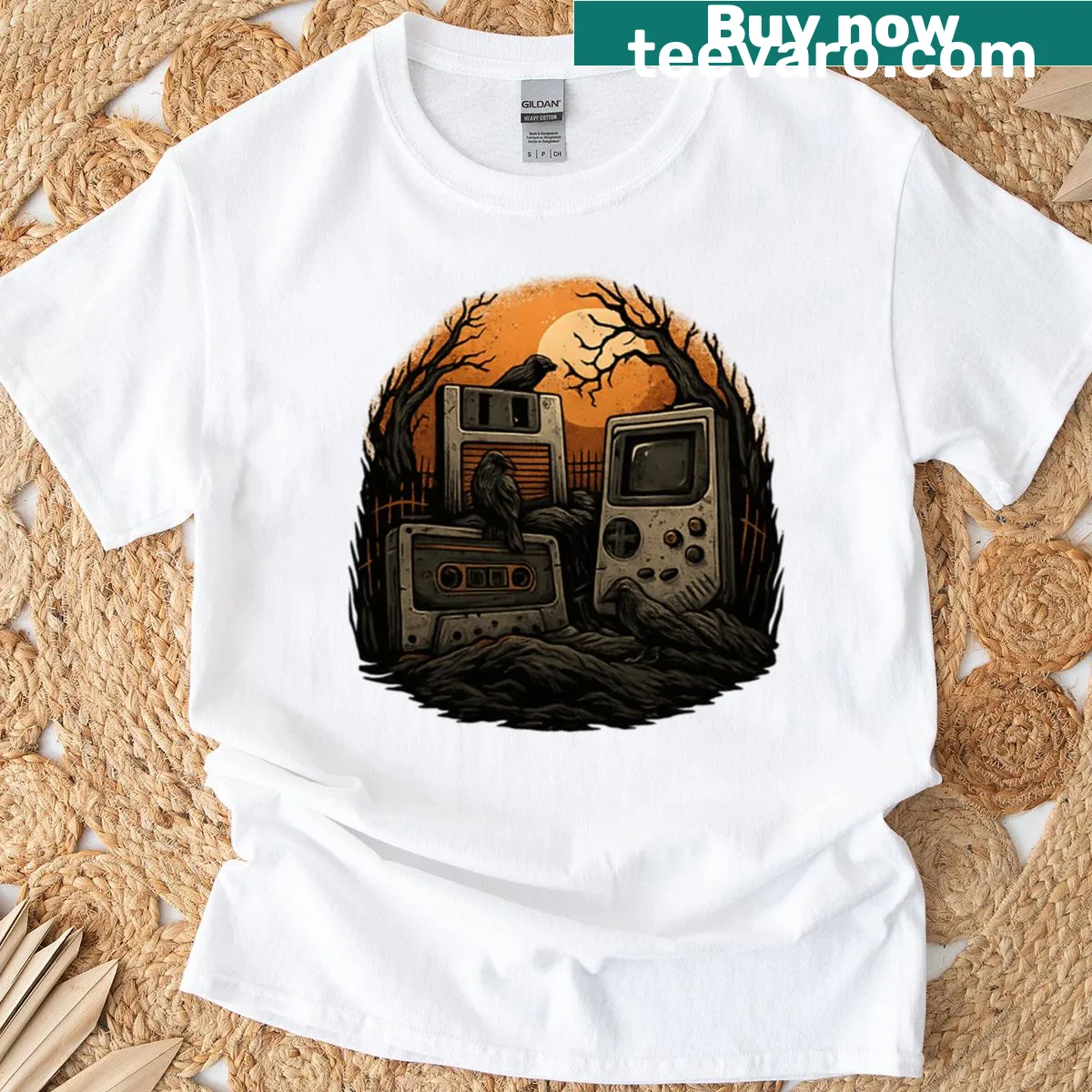 Retro Halloween shirt with graveyard, cassette, and Gameboy graphic. — on a men's t-shirt