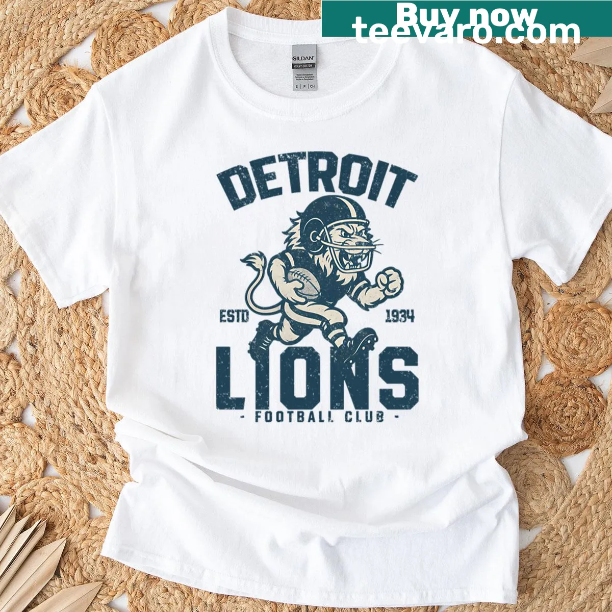 Retro Detroit Lions T-shirt featuring a cheerleading lion mascot — on a men's t-shirt