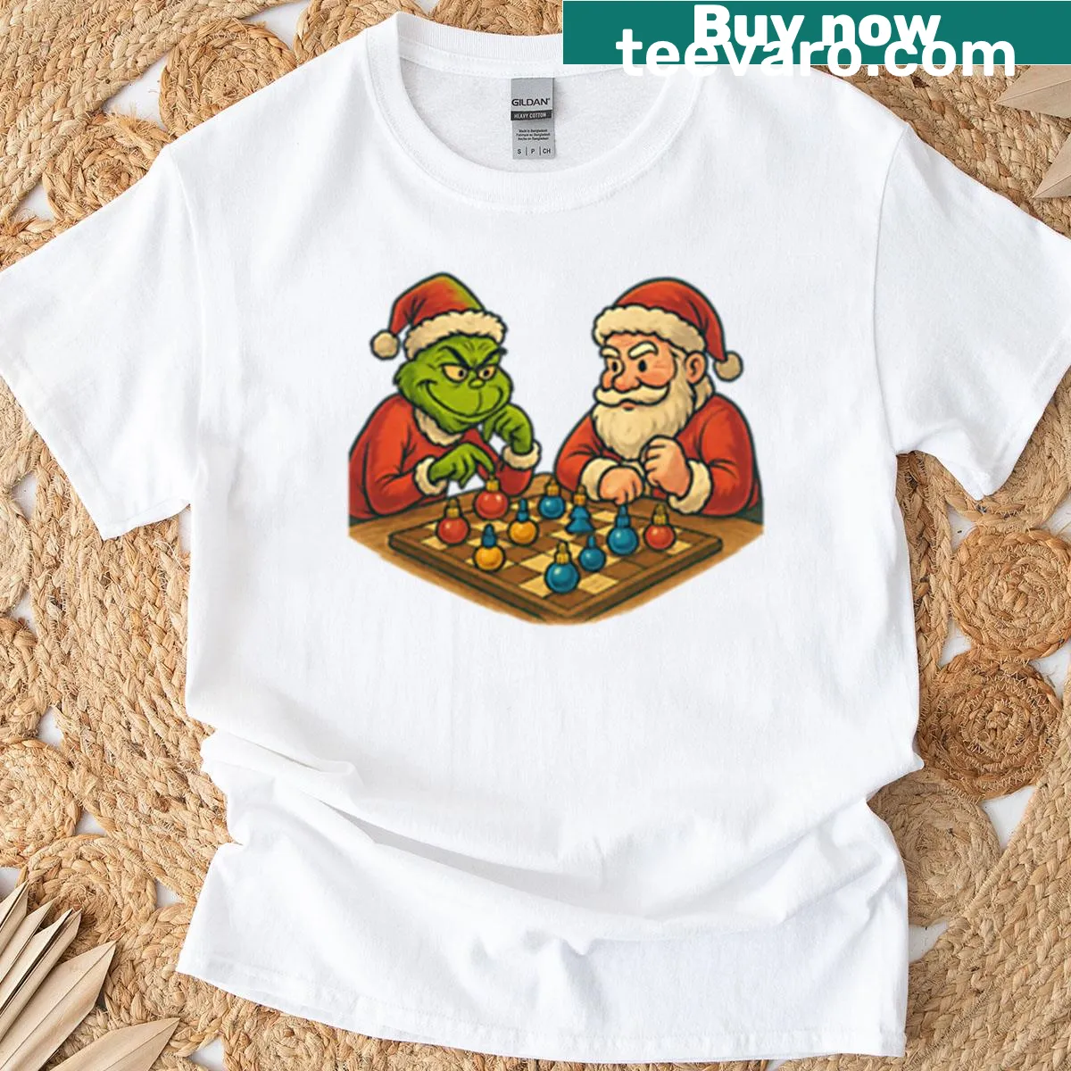 Whimsical Santa vs Grinch chess match illustration on t-shirt — on a men's t-shirt