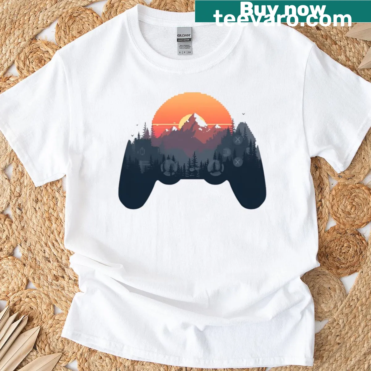 T-shirt featuring a sunset mountain landscape inside a game controller design — on a men's t-shirt