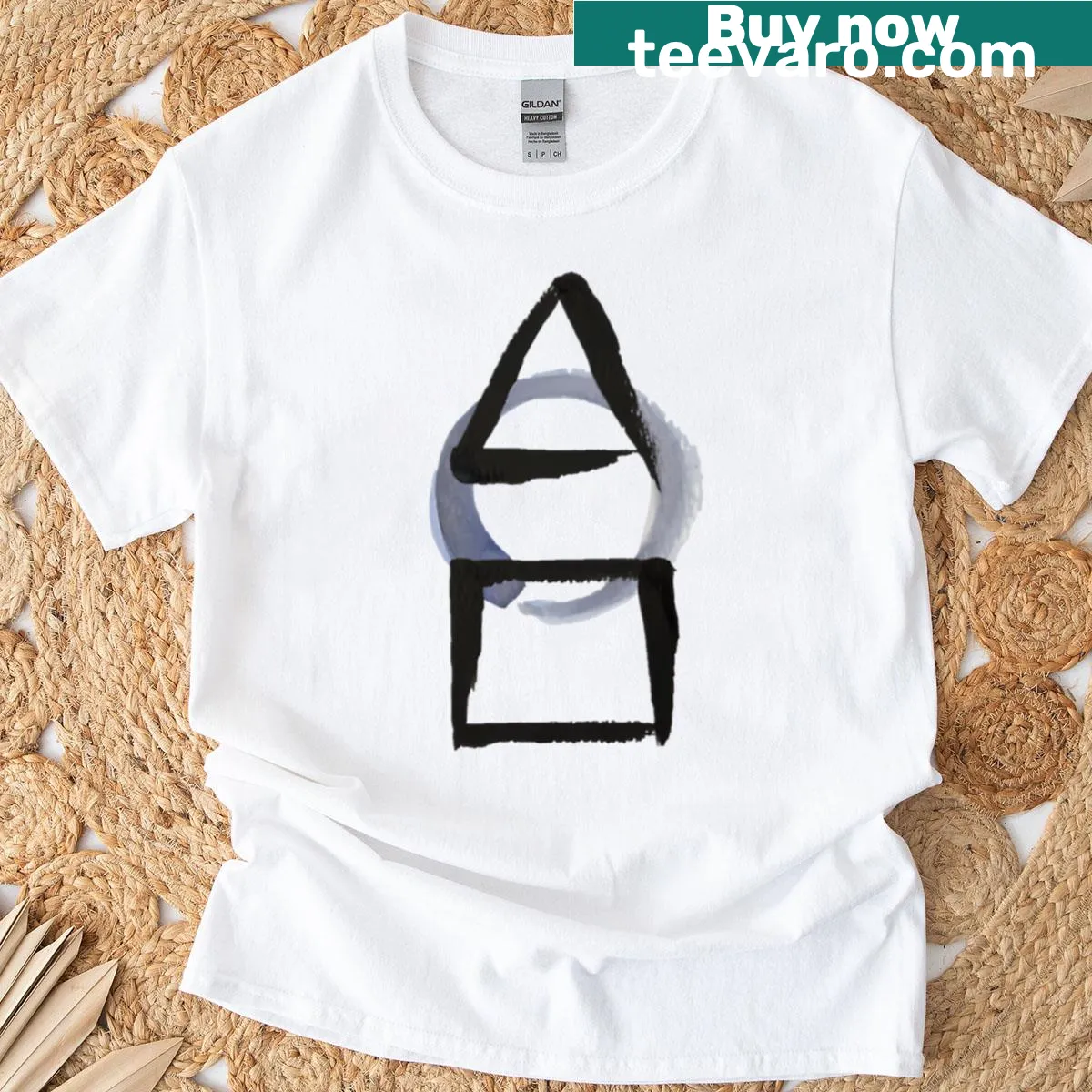 Minimalist t-shirt featuring abstract shapes and calligraphy — on a men's t-shirt