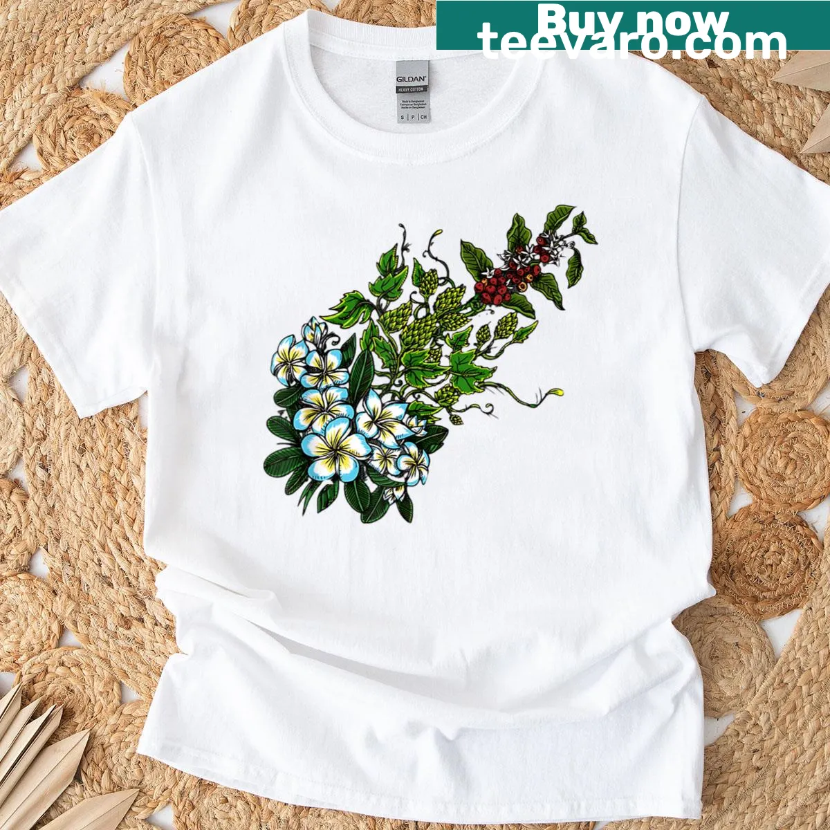 Nature-inspired t-shirt design featuring plumeria blossoms and coffee cherries — on a men's t-shirt