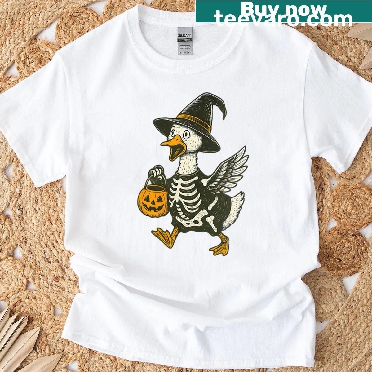 Halloween T-shirt with a skeleton goose holding a pumpkin lantern — on a men's t-shirt