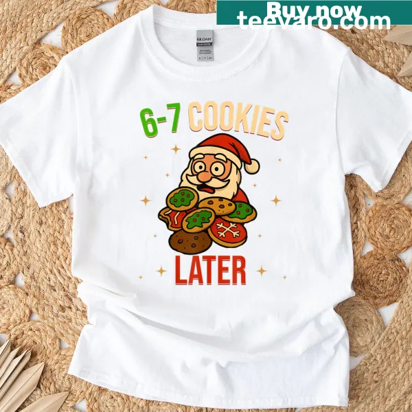 Funny Christmas T-shirt showing Santa eating a cookie.