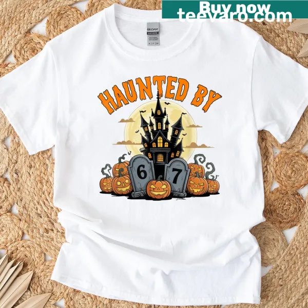 Vintage distressed Halloween t-shirt with 'Haunted By 67' text