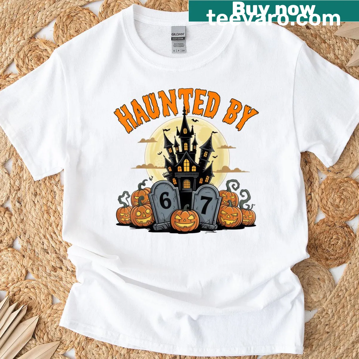 Vintage distressed Halloween t-shirt with 'Haunted By 67' text — on a men's t-shirt