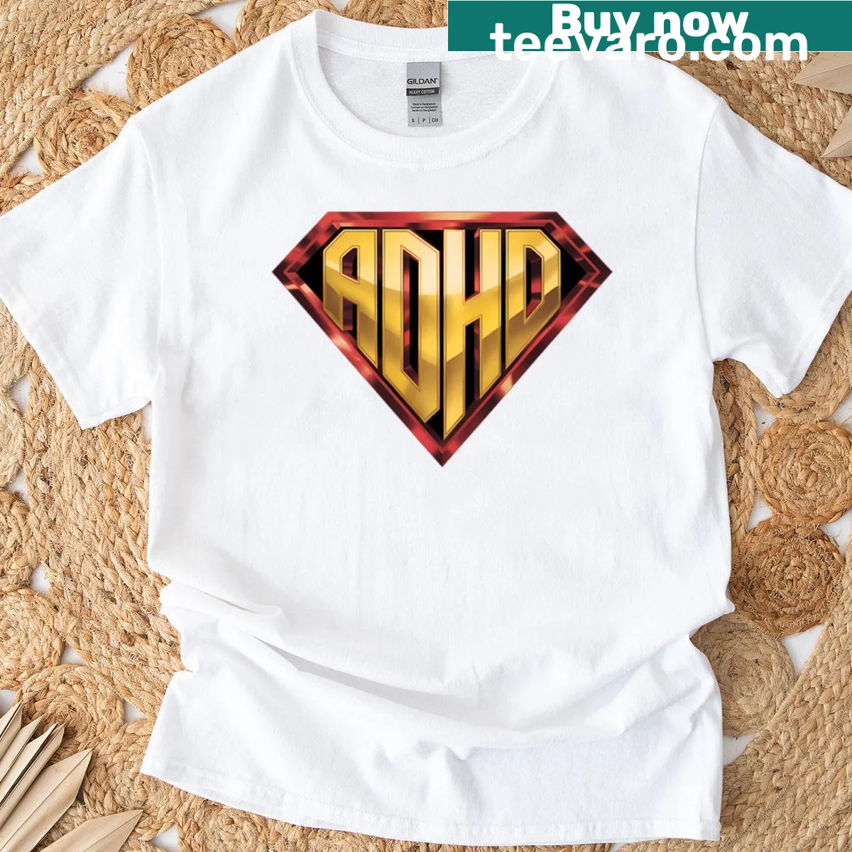 Gold superhero emblem representing ADHD on t-shirt — on a men's t-shirt