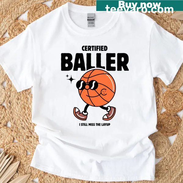 Bold typography on a T-shirt stating 'Certified Baller.'