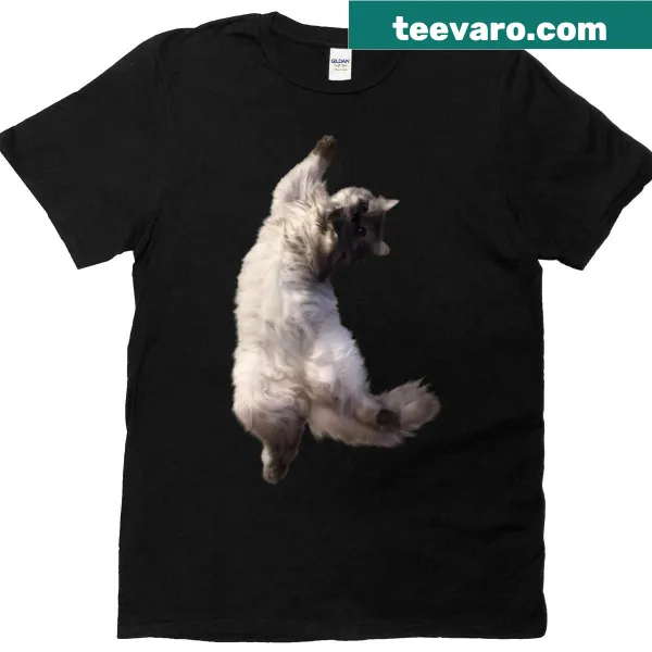 Oversized t-shirt with a whimsical floating cat in zero gravity