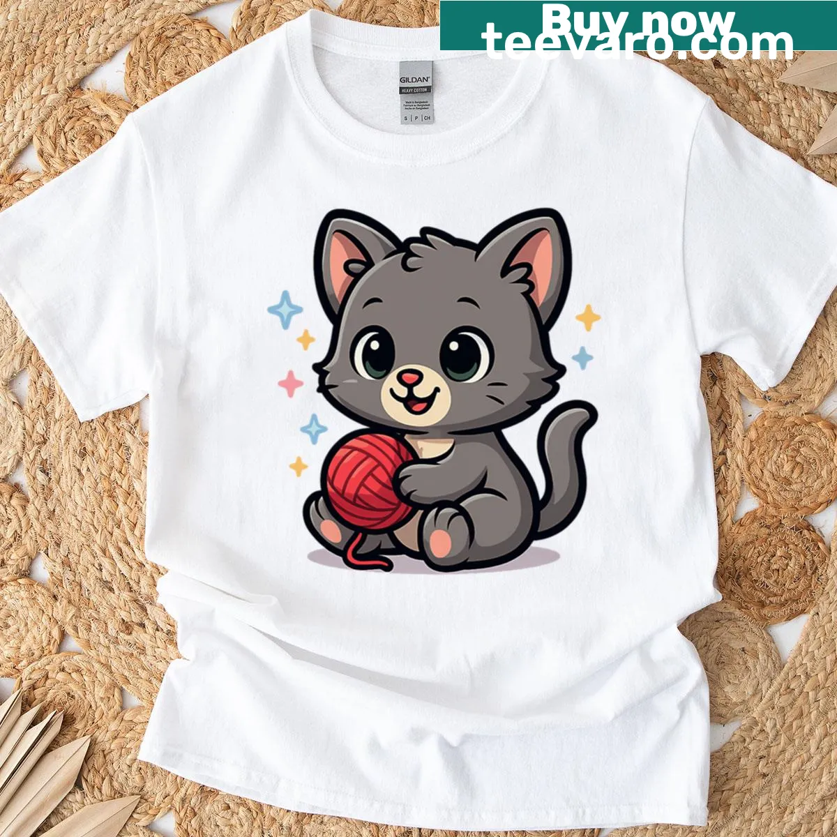 Cute kitten playing with red yarn graphic T-shirt — on a men's t-shirt