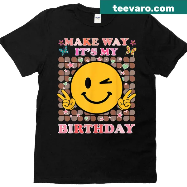 Groovy birthday t-shirt with a smiley face and flower graphic
