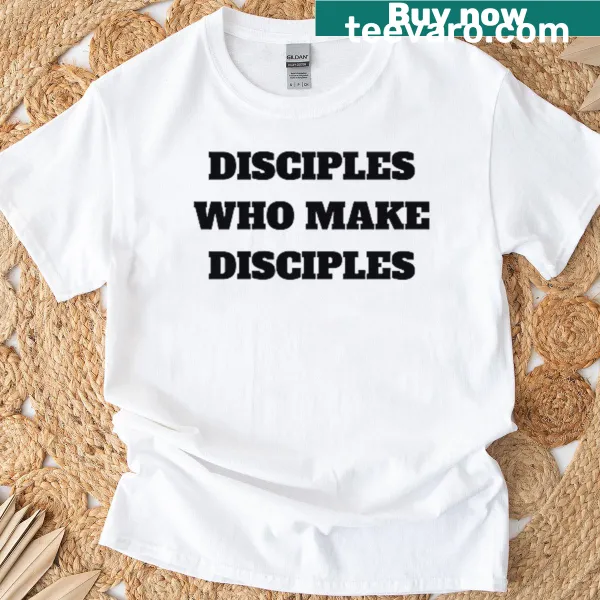 Inspirational T-shirt with text 'Moved By The Spirit' in elegant typography
