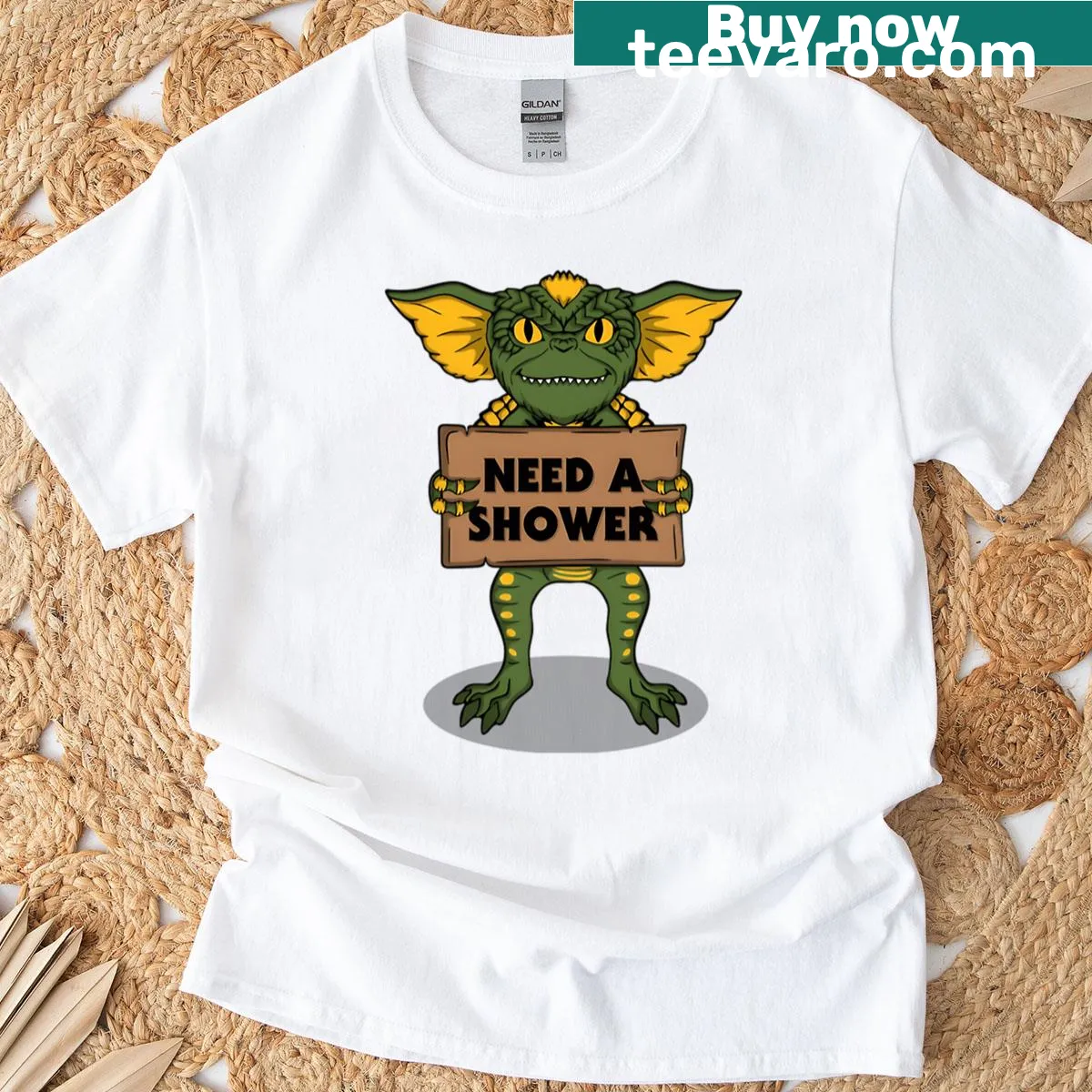 Vintage t-shirt with Christmas and 80s horror theme graphics — on a men's t-shirt