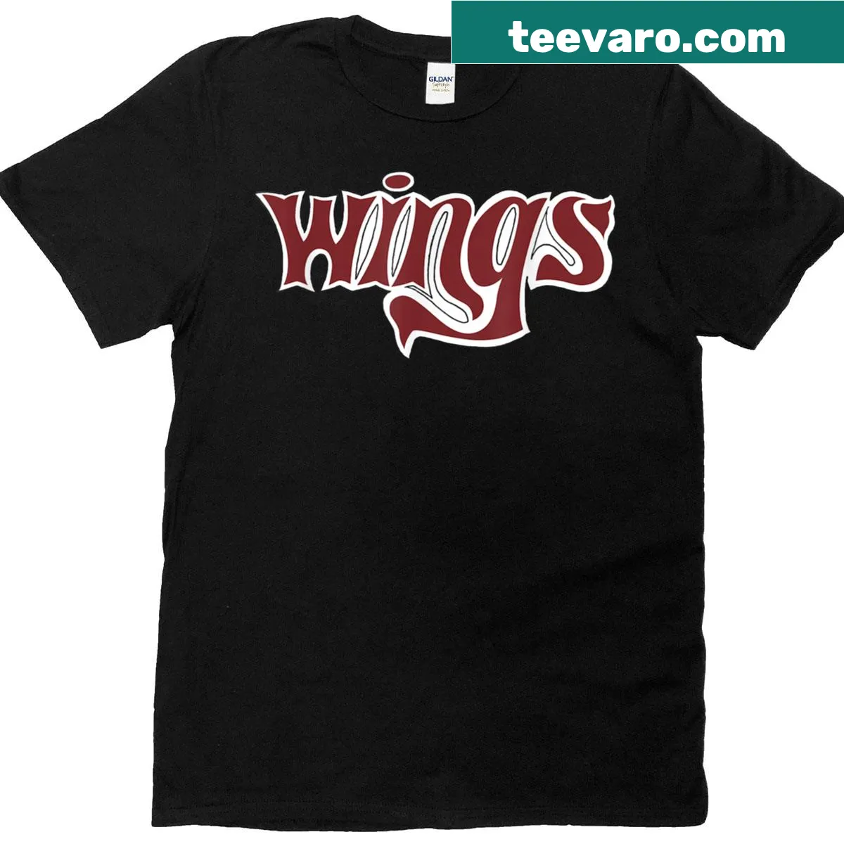 Official Paul McCartney Wings logo graphic on a T-shirt — on a men's t-shirt