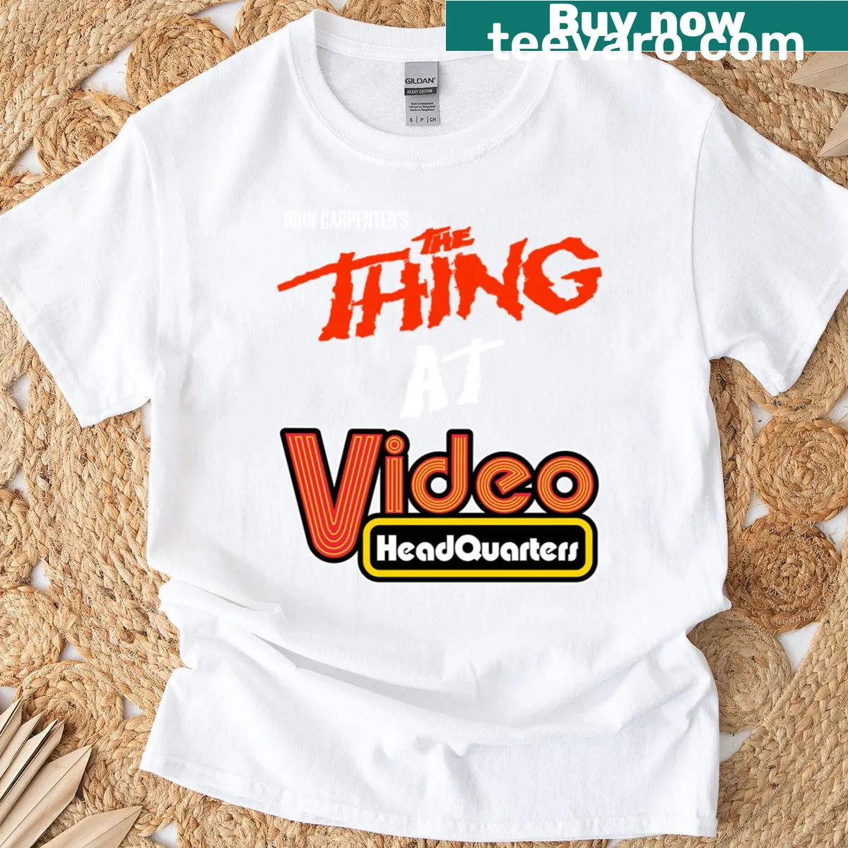 80s style oversized video rental t-shirt with retro graphics — on a men's t-shirt