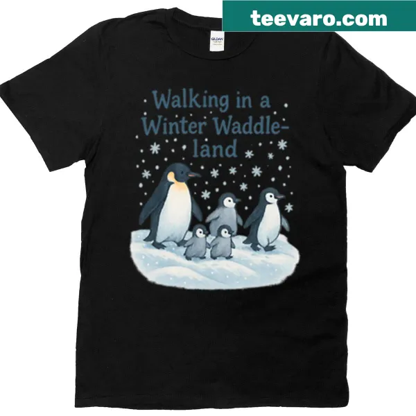 Cartoon penguins waddling in a winter landscape on a playful t-shirt
