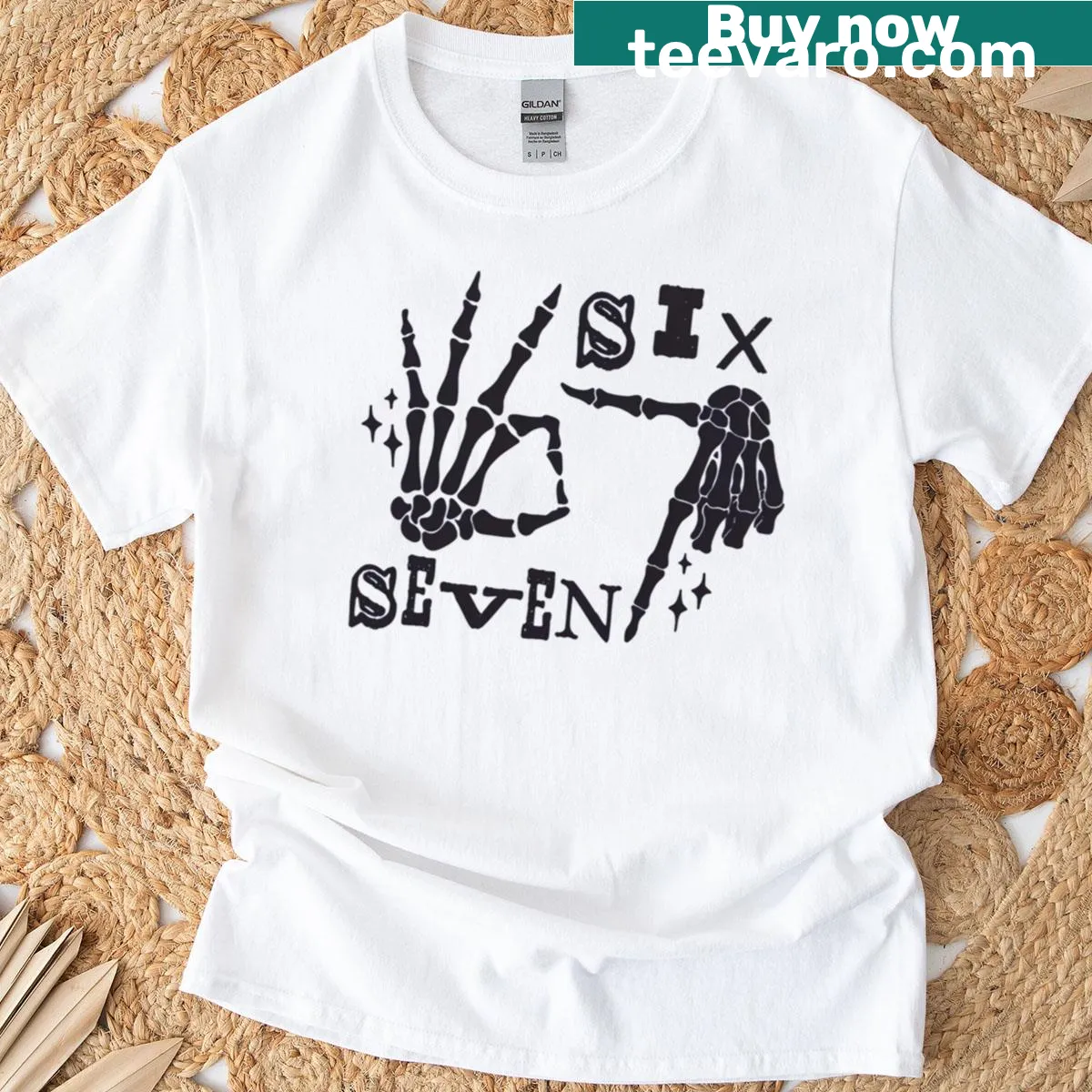 Halloween t-shirt with cartoon skeleton hands depicting '6 7' — on a men's t-shirt