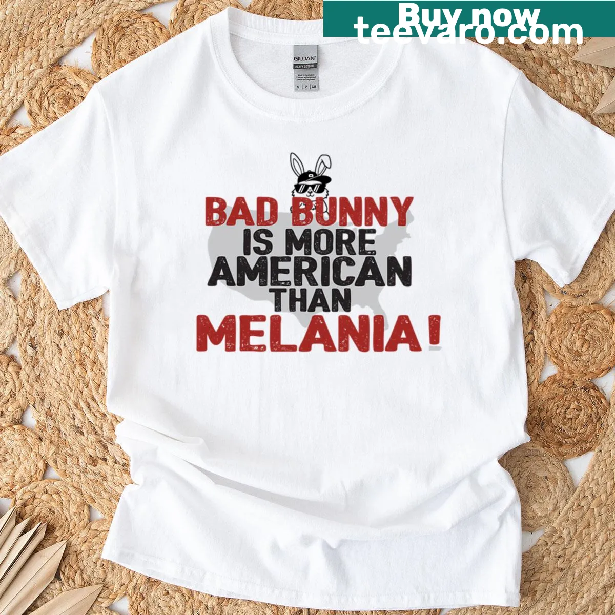 T-shirt with bold text: 'Bad Bunny Is More American Than Melania' — on a men's t-shirt