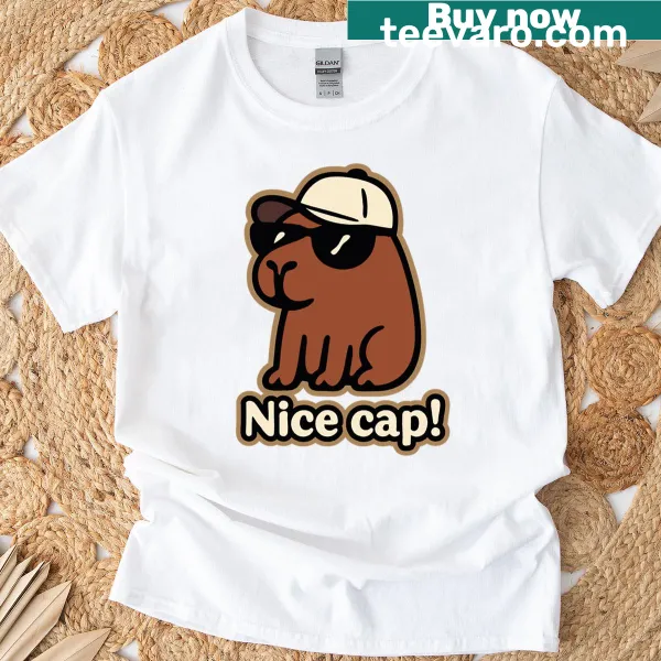 Cute T-shirt featuring a capybara wearing a cap