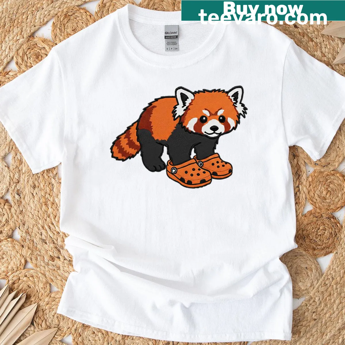 Oversized t-shirt featuring a cute red panda wearing Crocs — on a men's t-shirt