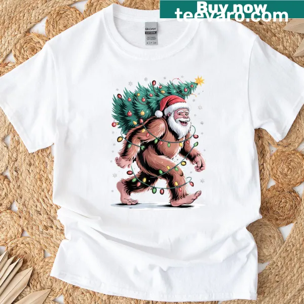 Bigfoot Santa carrying a Christmas tree t-shirt, cute holiday illustration