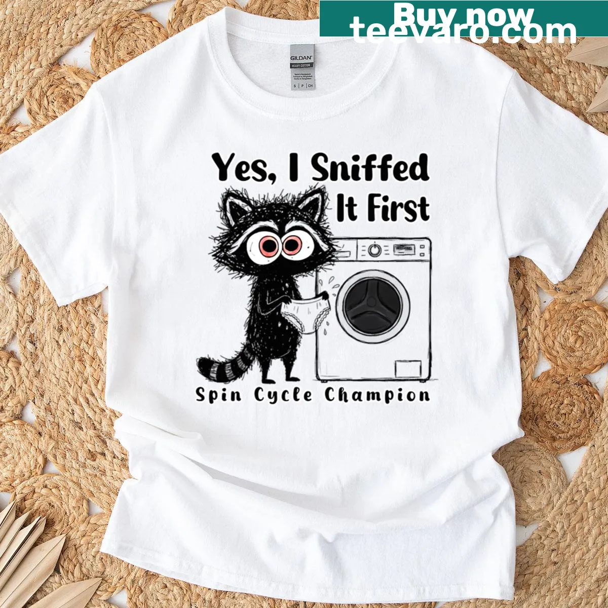 Cartoon raccoon on laundry basket t-shirt, humorously depicting laundry champion — on a men's t-shirt