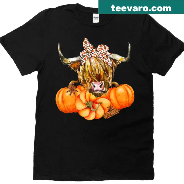 Autumn-themed T-shirt featuring a Highland cow with pumpkins.