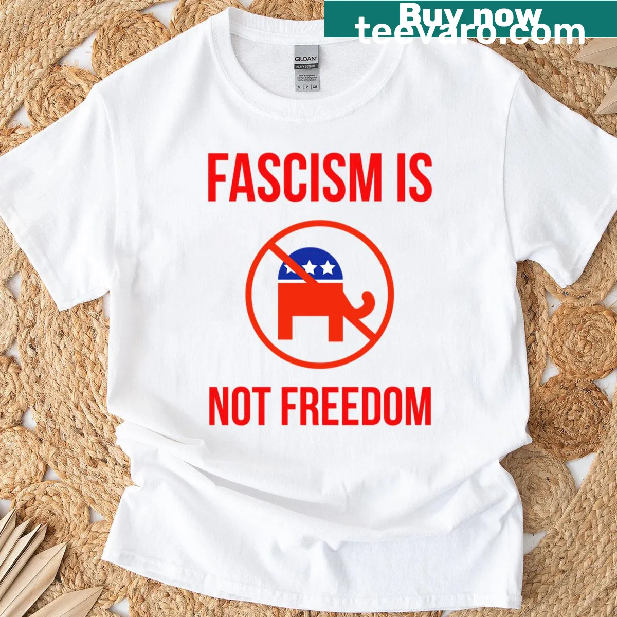 Bold text shirt stating Fascism Is Not Freedom — on a men's t-shirt