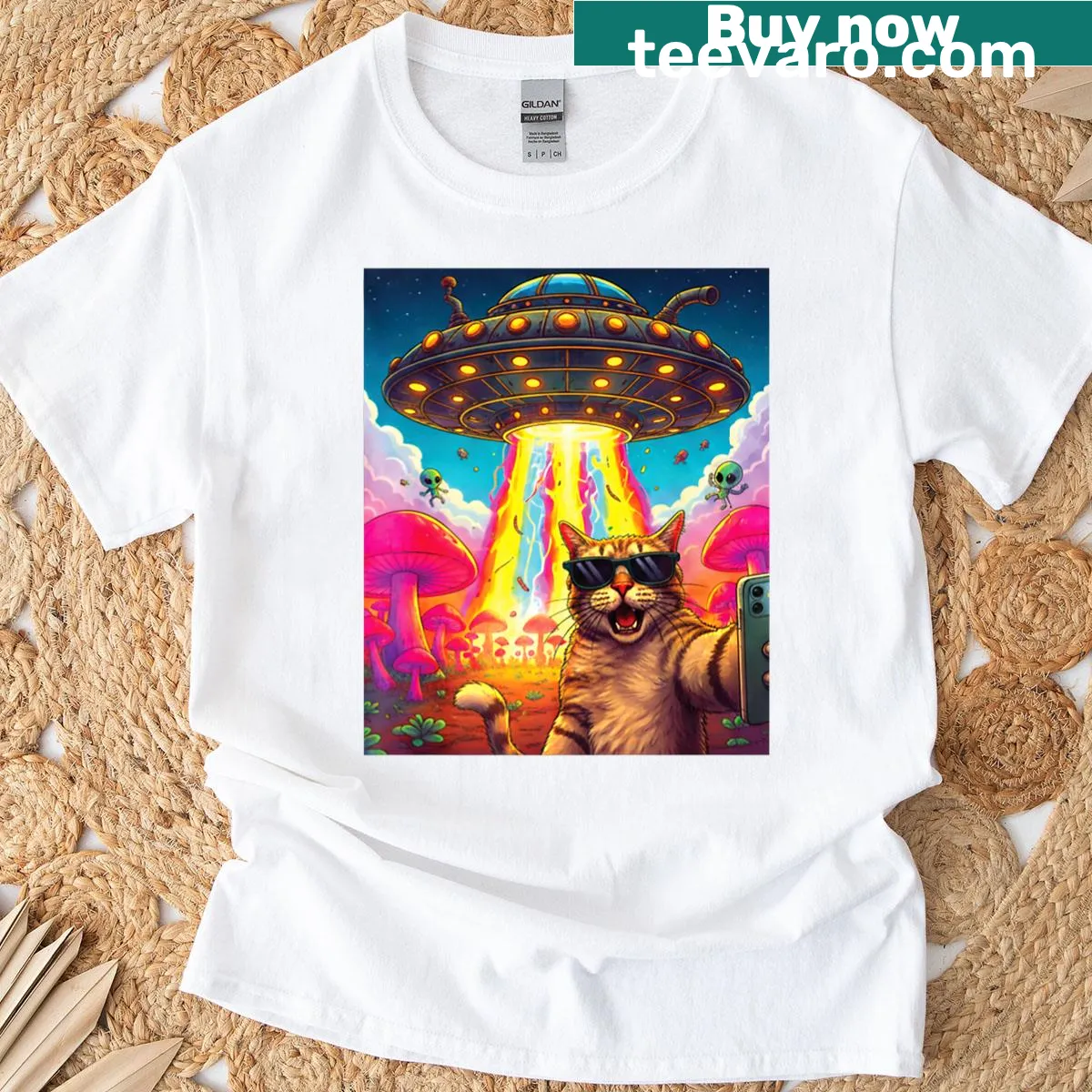 Whimsical cat and UFO design on t-shirt — on a men's t-shirt
