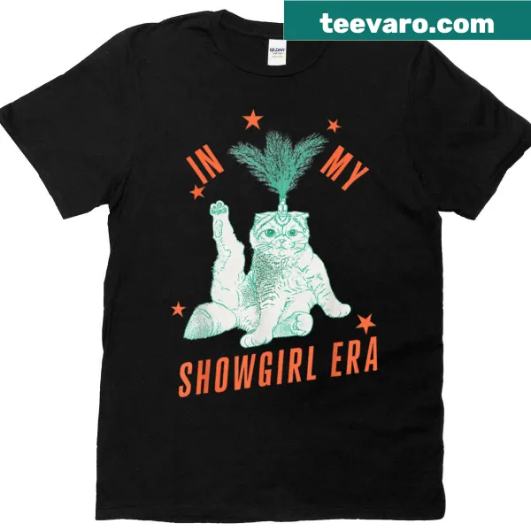 Whimsical cat in showgirl costume graphic on oversized t-shirt.