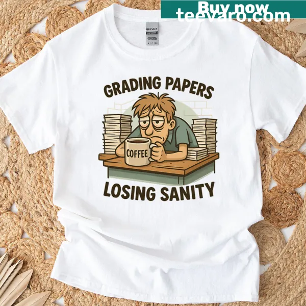 Cartoon design of tired teacher grading papers on T-shirt