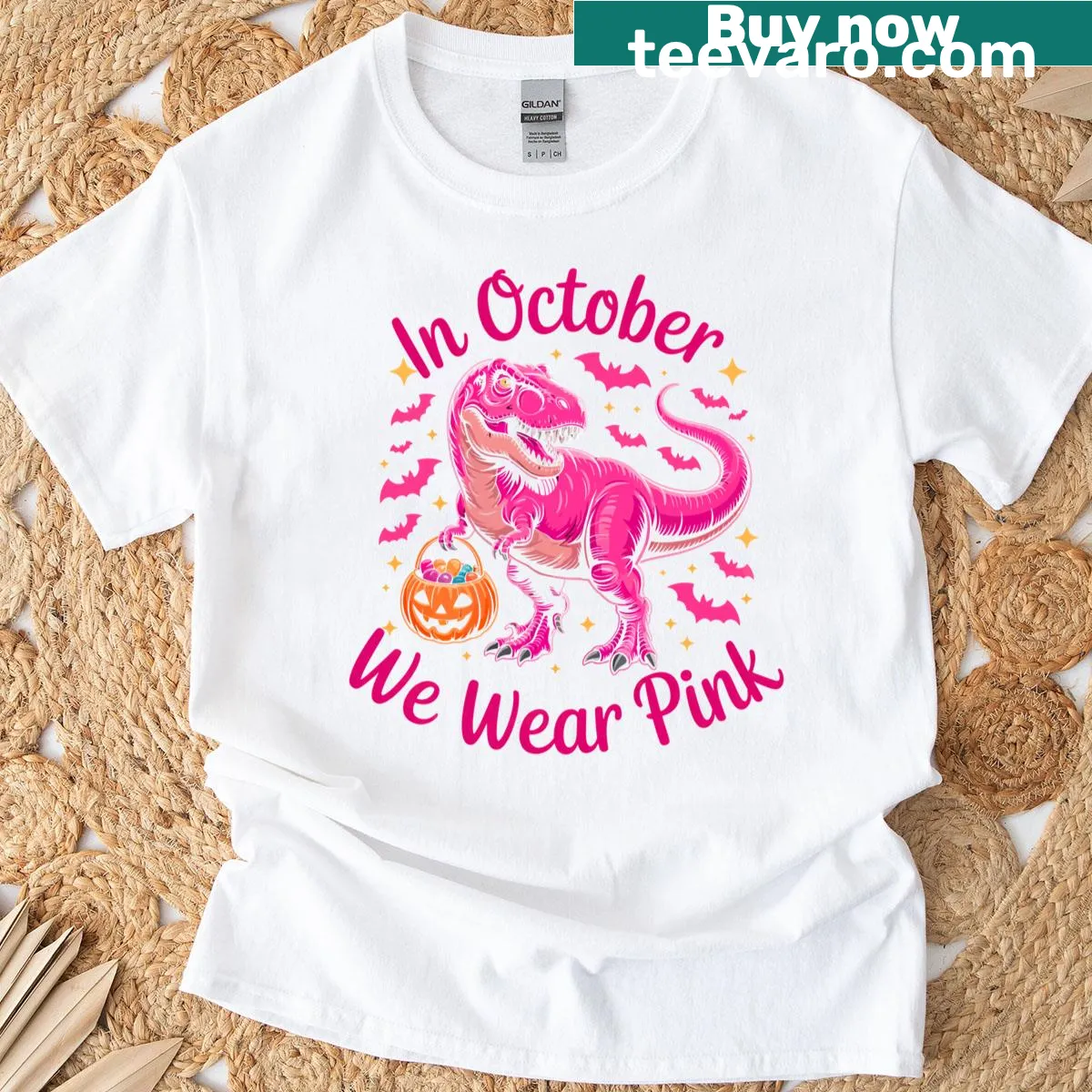 Pink dinosaur graphic promoting breast cancer awareness on a t-shirt — on a men's t-shirt