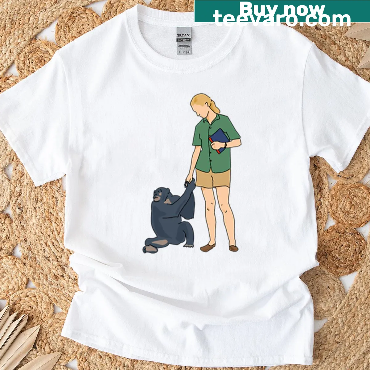T-shirt featuring an illustration of Jane Goodall with David Greybeard — on a men's t-shirt