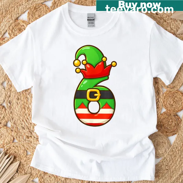 Playful Christmas meme graphic t-shirt for kids featuring number six design.