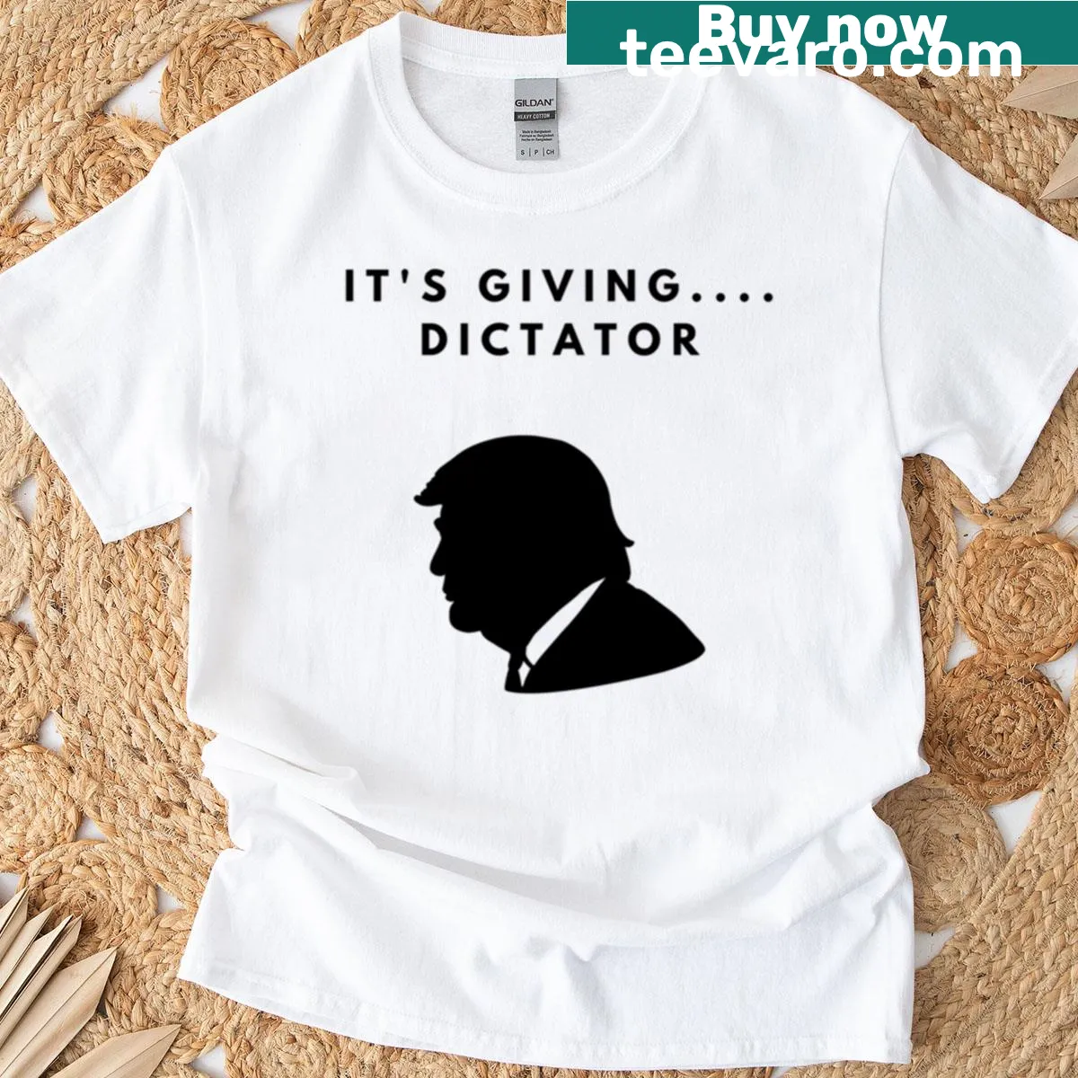 Oversized T-shirt with bold text saying 'It's Giving Dictator' — on a men's t-shirt