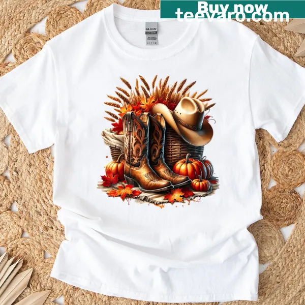 Autumn-themed T-shirt with pumpkins and cowboy boots illustration