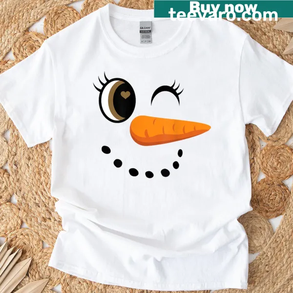 Whimsical snowman t-shirt with eyelashes and a festive design