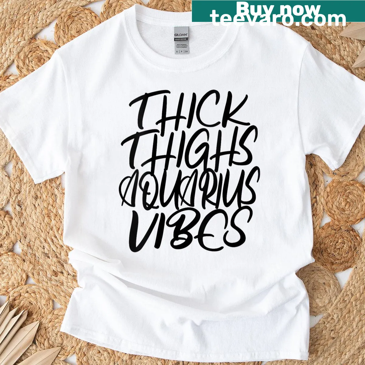 Women's T-shirt featuring 'Thick Thighs Aquarius Vibes' text — on a men's t-shirt